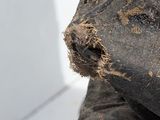 a close up of a pair of old worn shoes