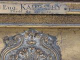 a close up of a plaque on the side of a building