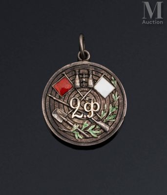 a close up of a medal on a black surface