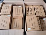 several cardboard boxes are stacked on top of each other in a box