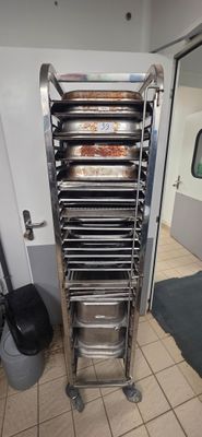an image of a commercial kitchen with a rack of food