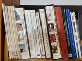 many books that are on a book shelf together