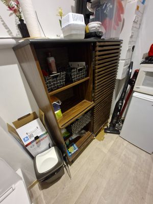 a small kitchen with a washer and dryer in it