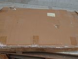 a cardboard box sitting on top of a pile of wood