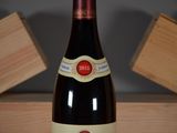 a bottle of wine that is sitting on a table