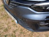a car that is parked on the side of the road