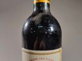 a bottle of wine that is sitting on a table