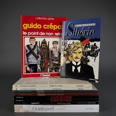 several books are stacked on top of each other on a table