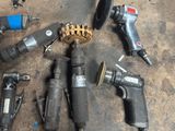 a lot of tools that are laying out on the floor