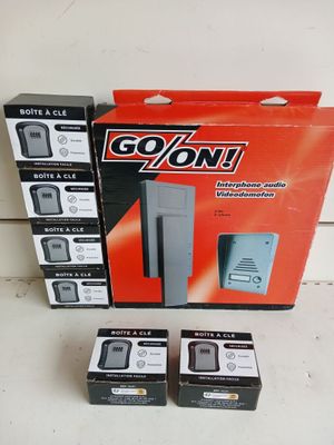 three boxes of electronic devices are sitting on a table