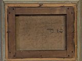 an old picture of a wooden frame with a picture in it