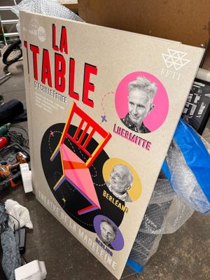 a box with a poster on it sitting on the ground