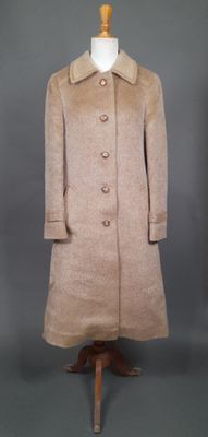 DELMOD INTERNATIONAL. Manteau long en laine de lama beige à …