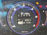 the dashboard of a car with a digital display on it ' s dashboard