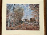 framed picture of a painting of a house in a wooded area