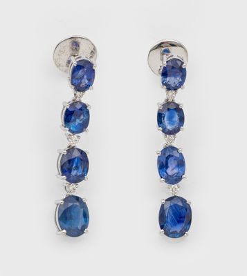 a pair of sapphire and diamond earrings