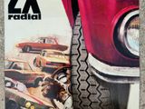 a skateboard that has a picture of a car on it