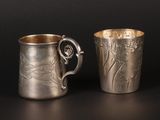 pair of antique silverplated mugs with floral designs