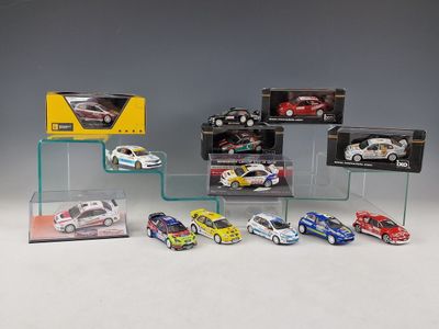 a lot of toy cars on display on a table