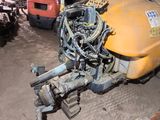 an image of a tractor with a large engine in a garage