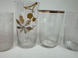 three glasses sitting next to each other on a table