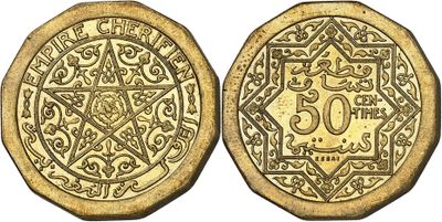 a gold coin with a design on it
