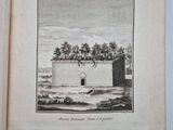 an open book with a drawing of a building in the middle of it