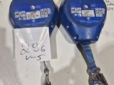a couple of blue tape measurers sitting on a table