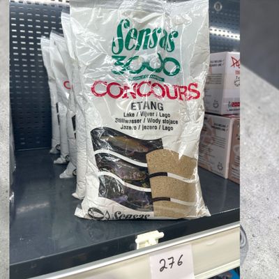 a bag of cookies sitting on a shelf in a store