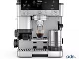 a close up of a coffee machine on a white surface