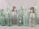a lot of empty bottles that are sitting on a table