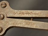 a close up of a pair of scissors on a table