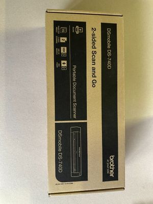 a box that is sitting on a table with a remote
