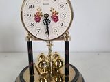 a clock that is sitting on top of a table