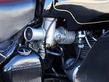a close up of a motorcycle with a black seat