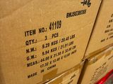 several boxes are stacked on top of each other in a warehouse
