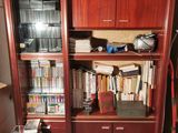 a book shelf with a lot of books on it