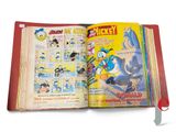 an open book with a picture of a cartoon character on it