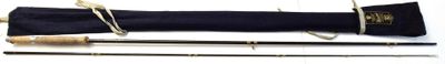 a picture of a pair of fishing rods and a reel