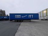 a semi truck that is parked in a parking lot