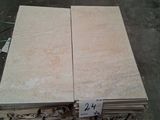 several stacks of white marble slabs stacked on top of each other