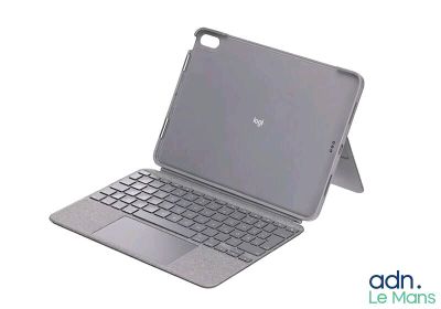 an image of a laptop with a keyboard on top of it