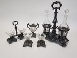 a lot of glass items that are sitting on a table