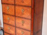 an image of a chest of drawers in a bedroom