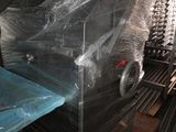 a large machine that is sitting inside of a building