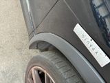 a close up of a car with a sticker on the side of it