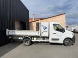 a white truck that is parked in front of a building