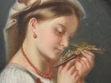 painting of a woman holding a bird in her hand