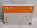 an orange and white tablet box sitting on top of a white table