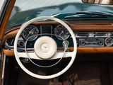 a car dashboard with a steering wheel and a dash board